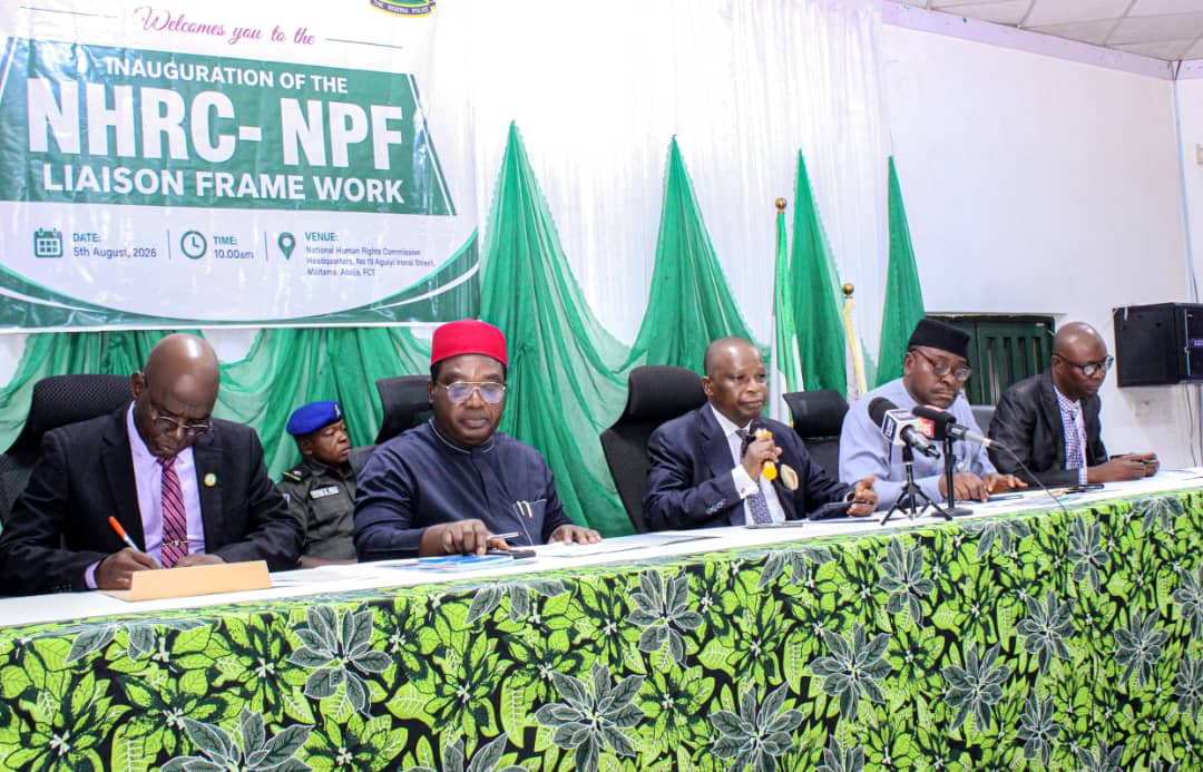 NHRC and justice officials at a formal event